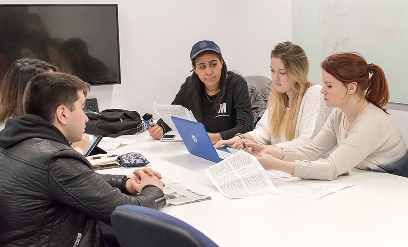 Students working in a library