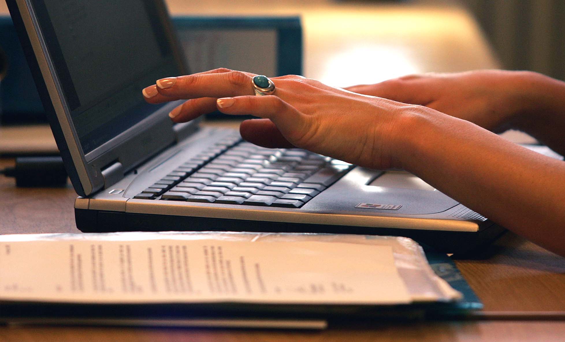 Researcher working at a computer